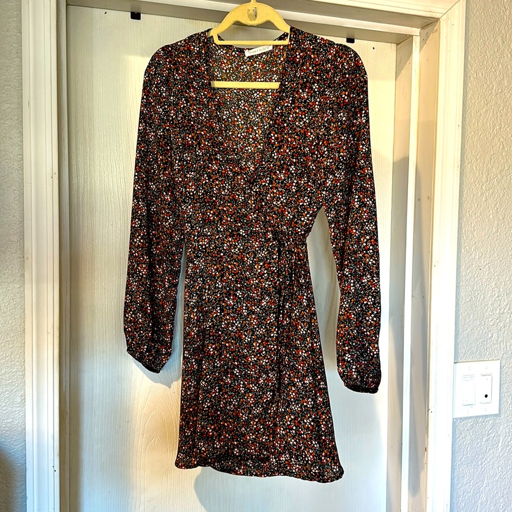 Long sleeve small floral wrap dress.